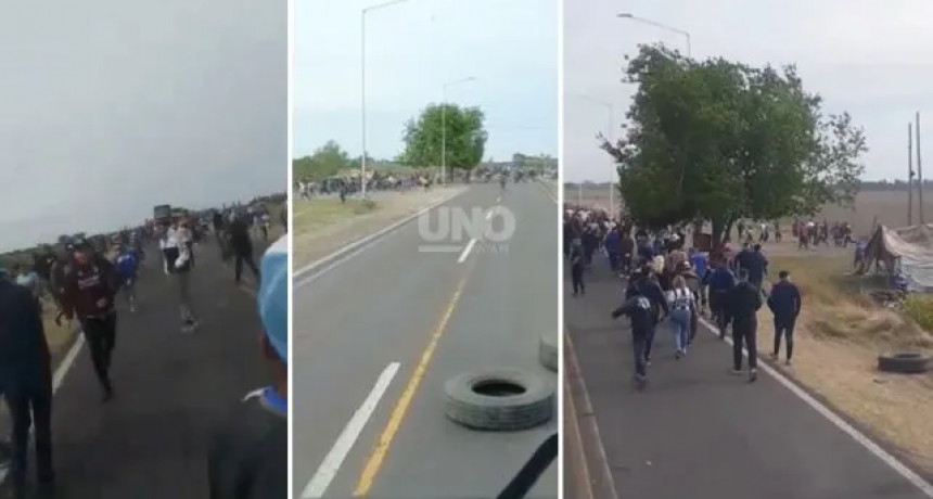 Hinchas de Talleres se enfrentaron con piqueteros que cortaban la ruta 11