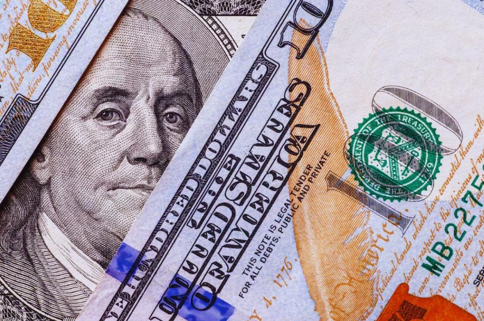 El dólar rozó el techo de la banda cambiaria y los bonos profundizaron la caída